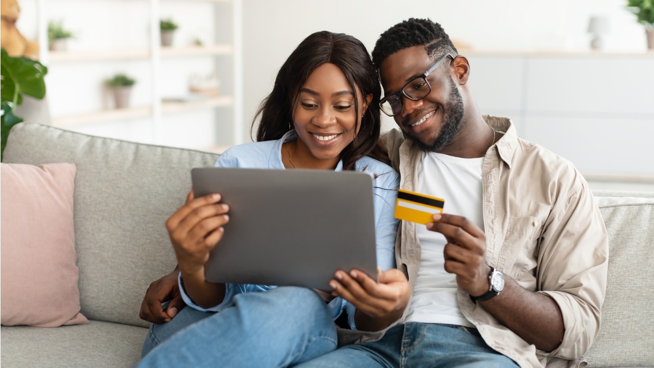 black-couple-using-pc-and-debit-credit-card-at-home.jpg_s=1024x1024&w=is&k=20&c=1Fo5FaJ7EYrnalIZYFiREqoDahWBdrsxXLcZUol5flM=