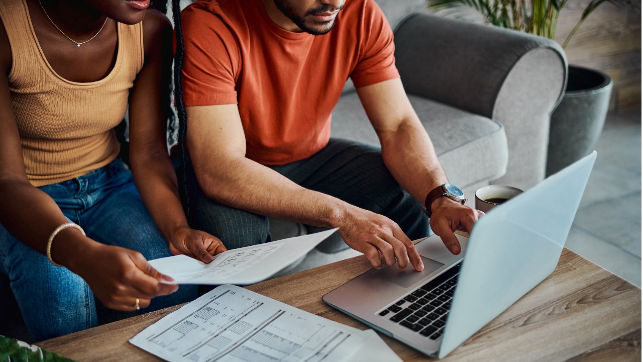 cropped-shot-of-an-unrecognisable-couple-sitting-in-the-living-room-and-using-a-laptop-to.jpg_s=1024x1024&w=is&k=20&c=-yRiLPdGJKKafSE8sZZKBdJQL1GJXB9L6v6comrWHEs= (1)