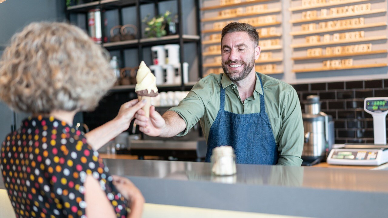 friendly-worker-at-the-ice-cream-parlor-handing-an-ice-cream-to-senior-woman-smiling.jpg_s=1024x1024&w=is&k=20&c=_JKArJrbzyLItmiJRxGywkBmqVDe4scEeVZzuw6qLPg=