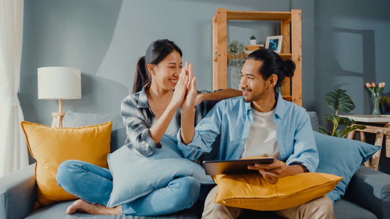 happy-asian-young-attractive-couple-man-and-woman-sit-on-couch-use-tablet-shopping-online.jpg_s=1024x1024&w=is&k=20&c=LyAEjMJ7ZXbWLINooV1wlznTR_xtDqxjnvTwUDrONlE=